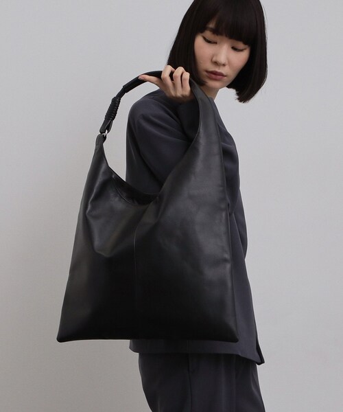 tk.TAKEO KIKUCHI（ティーケータケオキクチ）の「【牛革使用】リアルレザートラペゾイドバッグ（トートバッグ・メンズ・ブラック・00）」の5枚目の写真