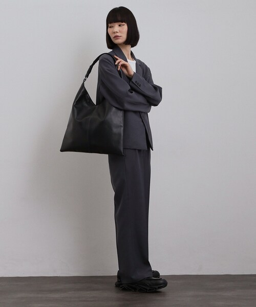 tk.TAKEO KIKUCHI（ティーケータケオキクチ）の「【牛革使用】リアルレザートラペゾイドバッグ（トートバッグ・メンズ・ブラック・00）」の6枚目の写真