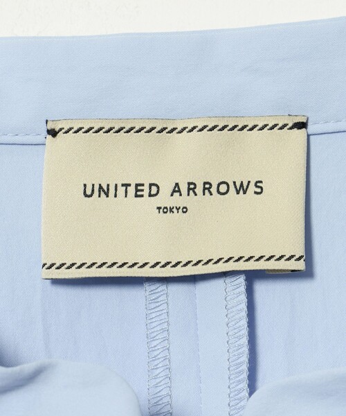 UNITED ARROWS(ユナイテッドアローズ)の「メロー フリル スキッパー ワンピース ‐防シワ 吸水速乾 UVカット 遮熱性 接触冷感‐(ワンピース・レディース・ネイビー/ライトブルー・36/38)」の12枚目の写真