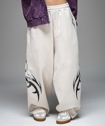 ILL'S（イルズ）の「AW メタルプリント トライバルワイドスウェットパンツ メンズ レディース ユニセックス 【ILL'S】（スウェットパンツ）」