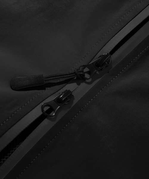 TRILLION(トリリオン)の「ディビジョンナイロンフード集業ベスト(BLACK)(ベスト・レディース・その他・MEDIUM/LARGE)」の8枚目の写真
