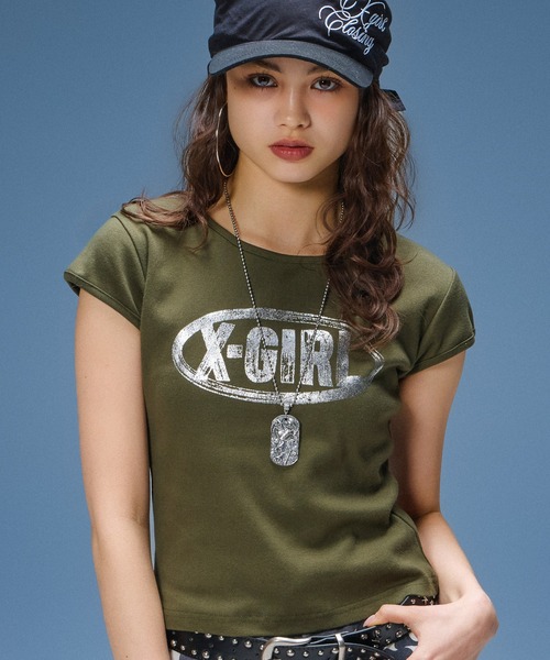 X-girl(エックスガール)の「OVAL LOGO CRACKED FOIL PRINT S/S BABY TEE(Tシャツ/カットソー・レディース・ブラック/オリーブ/ホワイト・S/M)」の1枚目の写真