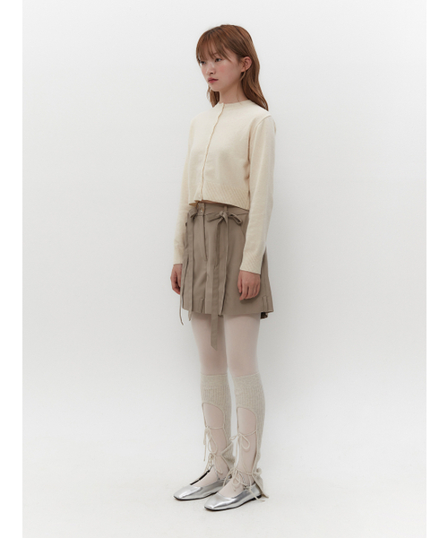 TUOMIO（トゥオミオ）の「BUTTON POINT CARDIGAN [IVORY]（カーディガン/ボレロ・レディース・その他・1/2）」の3枚目の写真