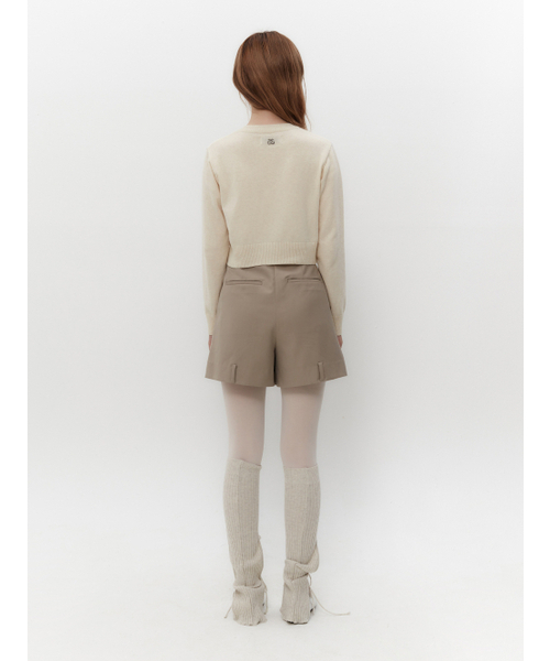 TUOMIO（トゥオミオ）の「BUTTON POINT CARDIGAN [IVORY]（カーディガン/ボレロ・レディース・その他・1/2）」の4枚目の写真