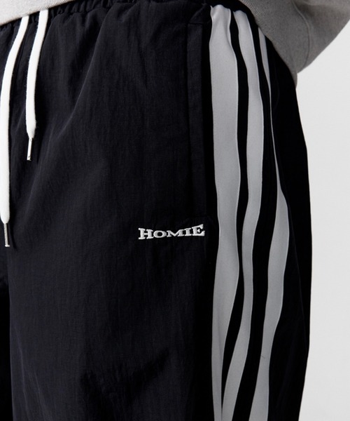 ESC STUDIO(イーエスシースタジオ)の「【ESC STUDIO】HOMIE 3-stripe track panrt / 【イーエスシーステュディオ】ホーミースリーストライプナイロントラックパンツ(その他パンツ・メンズ・ブラック/ブルー・ONE SIZE)」の11枚目の写真