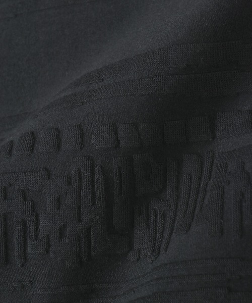 The DUFFER of ST.GEORGE(ザダファーオブセントジョージ)の「ORIGINAL JQ POLO SHIRT:バティック柄 ジャガードポロ / コットンポロ / 幾何学模様 / レトロストリート(ポロシャツ・メンズ・スミクロ・X-LARGE/LARGE/MEDIUM)」の4枚目の写真