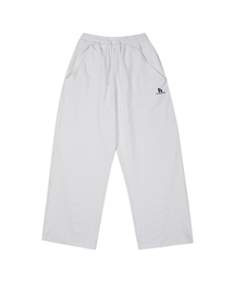 NETHERWORLD（ネザーワールド）の「SPORTY LOGO SWEATPANTS SOFT WHITE（スウェットパンツ）」