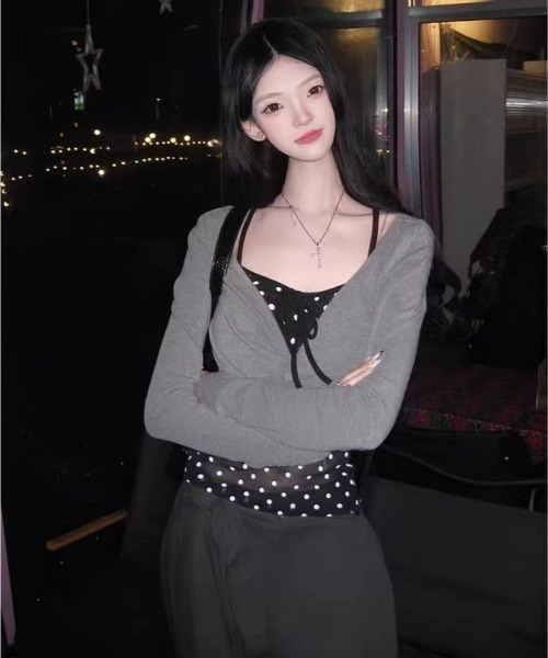 Ritzy（リッツィー）の「前身ツイスト フェイクレイヤードトッド柄ロングスリーブトップス（Tシャツ/カットソー・レディース・ブラック・M/L）」の5枚目の写真