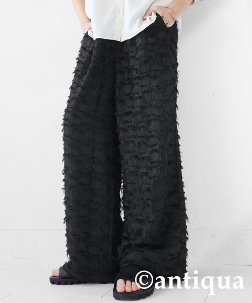 antiqua(アンティカ)の「フリンジワイドパンツ(その他パンツ・レディース・ブラック・LARGE/MEDIUM)」の1枚目の写真