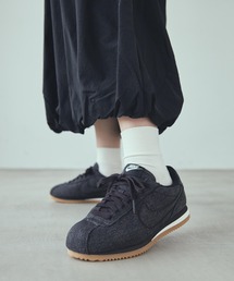 NIKE（ナイキ）の「ナイキ コルテッツ テキスタイル ウィメンズシューズ   Nike Cortez Textile Women's Shoes IM8052-010 Black（スニーカー）」