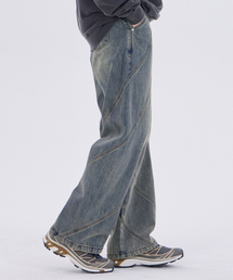 DYSFUNCT（ディスファンクト）の「TWIST INCISION WASHING DENIM PANTS(SAND BLUE)（デニムパンツ）」