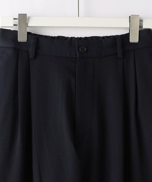green label relaxing(グリーンレーベルリラクシング)の「TRカルゼ 2プリーツ テーパード パンツ -ストレッチ-(その他パンツ・メンズ・ネイビー/オフホワイト・S/M/L)」の14枚目の写真