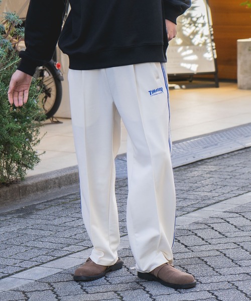 THRASHER(スラッシャー)の「【THRASHER/スラッシャー】【高級感あるジャガードテープが際立つ1本】サイドライン ジャージワイドトラックパンツ ブランドロゴ刺繍 きれいめ ストリート スケーター ユニセックス(その他パンツ・メンズ・ホワイト/ブラック・MEDIUM/LARGE)」の7枚目の写真