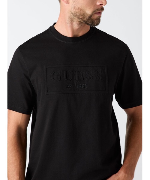 Guess(ゲス)の「BOX Logo Embossed Tee Tシャツ ロゴTシャツ(Tシャツ/カットソー・メンズ・ホワイト/ブラック・MEDIUM/X-LARGE/LARGE/SMALL)」の3枚目の写真