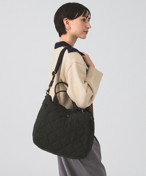 toleur(トーラ)の「【別注】toleur / ナイロン キルト バッグ(ショルダーバッグ・レディース・ナチュラル/ブラック・ONE SIZE)」の1枚目の写真