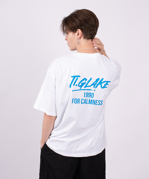 TI.GLAKE(ティーグレイク)の「1990レタリングオーバーサイズ半袖Tシャツホワイト(スウェット・メンズ・その他・M/L/XL/XXL)」の1枚目の写真