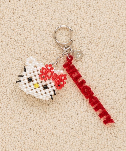 Me%(ミィパーセント)の「【HELLO KITTY】フェイスビーズキーチャーム 641552(キーホルダー・レディース・レッド/ゴールド/ブラック系その他/ブラック・FREE)」の1枚目の写真
