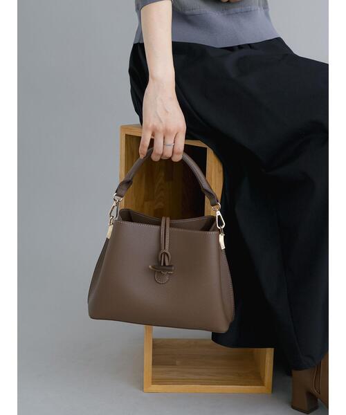 Te chichi(テチチ)の「トグル合皮ミニバッグ(ハンドバッグ・レディース・ブラウン/ブラック・F)」の2枚目の写真