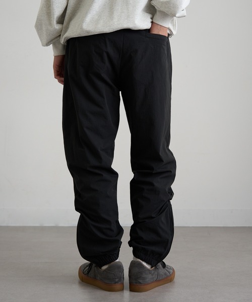 BEIMAR(ビーマー)の「【BEIMAR】ウォーターリパレントライントラックパンツ ナイロンパンツ 撥水 ゴープコア BMWB103MTP MURS(スウェットパンツ・メンズ・クリーム/ブラック/ブルー・XL/L/M/S/2XL)」の5枚目の写真