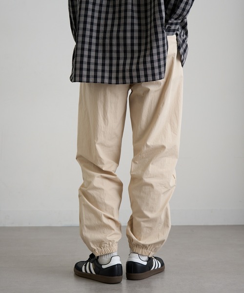 BEIMAR(ビーマー)の「【BEIMAR】ウォーターリパレントライントラックパンツ ナイロンパンツ 撥水 ゴープコア BMWB103MTP MURS(スウェットパンツ・メンズ・クリーム/ブラック/ブルー・XL/L/M/S/2XL)」の14枚目の写真