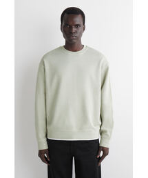 COS（コス）の「ウォッシュドスウェットシャツ - コットン素材（スウェット）」