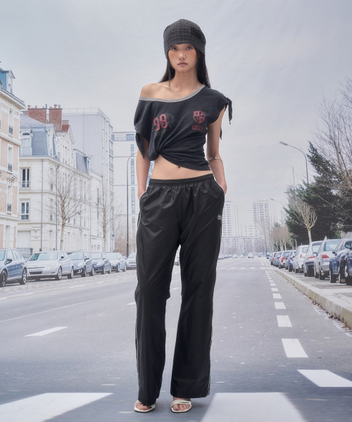 SOMSOC(ソムソック)の「LAURA DOT PIPING TRACK PANTS_BLACK(スウェットパンツ・レディース・その他・FREE)」の1枚目の写真