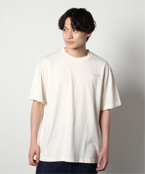 SALVAGE PUBLIC(サルベージパブリック)の「【SALVAGE PUBLIC/サルベージパブリック×JS】別注 ピグメント Tシャツ“SHAK”(Tシャツ/カットソー・メンズ・アイボリー/サファリグリーン・MEDIUM/LARGE)」の1枚目の写真