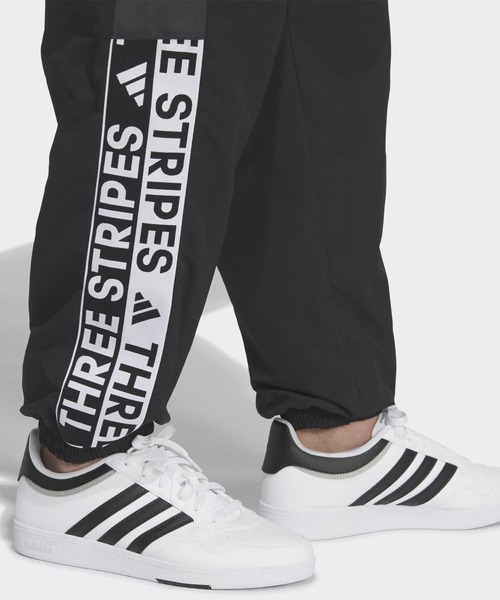 【新品未使用】ADIDASウーブンプリントトラックパンツ XS（US：2XS） adidas パンツ キッズ マストハブ ルーズフィット WIND. RDY