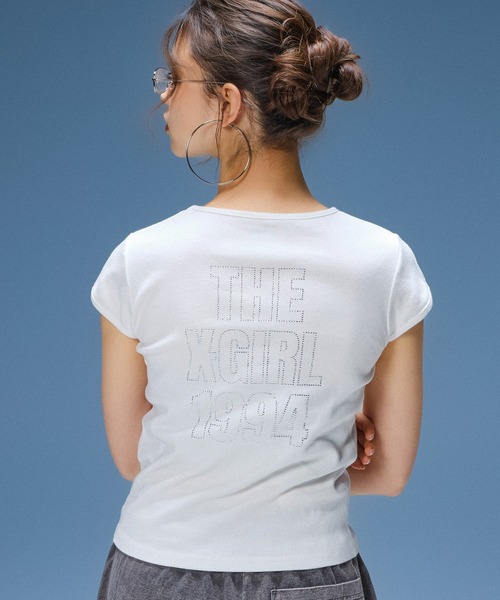 X-girl(エックスガール)の「RHINESTONE SKULL S/S BABY TEE(Tシャツ/カットソー・レディース・ブラック/ホワイト・S/M)」の2枚目の写真