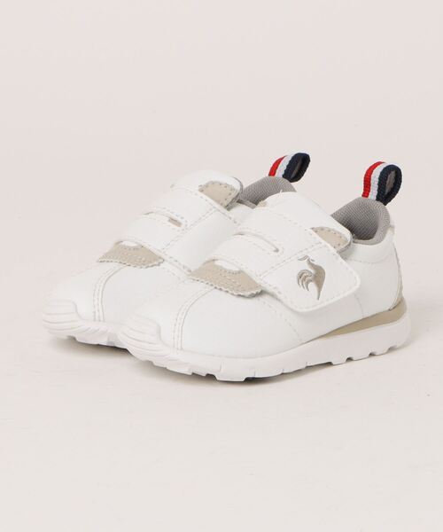 le coq sportif（ルコックスポルティフ）の「le coq sportif ルコックスポルティフ LCS MONTPELLIER 6 F【脱ぎ履き簡単】ベビーシューズ(LCSモンペリエ6F)（スニーカー・キッズ・ホワイト系その他/ホワイト×ネイビー・15.0cm/16.0cm/14.0cm/13.0cm）」の2枚目の写真