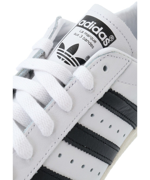 1er Arrondissement（プルミエアロンディスモン）の「＜ADIDAS（アディダス）＞SUPER STAR82 スニーカー（その他シューズ・レディース・ホワイト系その他3/ブラック系その他3・25/24/23）」の15枚目の写真