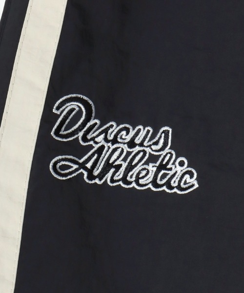 DISCUS（ディスカス）の「2026SS DISCUS/ディスカス ナイロン ワンポイントロゴ刺繍 サイドライン ワイドトラックパンツ レディース メンズ（その他パンツ・メンズ・アイボリー/ブラック/ベージュ/ネイビー・M/L/LL）」の15枚目の写真