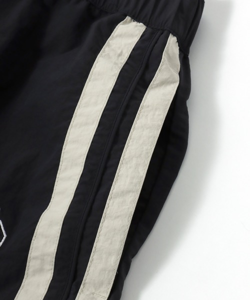 DISCUS（ディスカス）の「2026SS DISCUS/ディスカス ナイロン ワンポイントロゴ刺繍 サイドライン ワイドトラックパンツ レディース メンズ（その他パンツ・メンズ・アイボリー/ブラック/ベージュ/ネイビー・M/L/LL）」の16枚目の写真