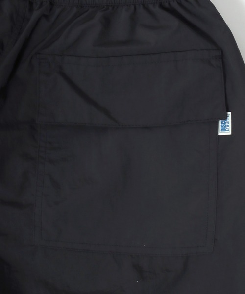 DISCUS（ディスカス）の「2026SS DISCUS/ディスカス ナイロン ワンポイントロゴ刺繍 サイドライン ワイドトラックパンツ レディース メンズ（その他パンツ・メンズ・アイボリー/ブラック/ベージュ/ネイビー・M/L/LL）」の20枚目の写真