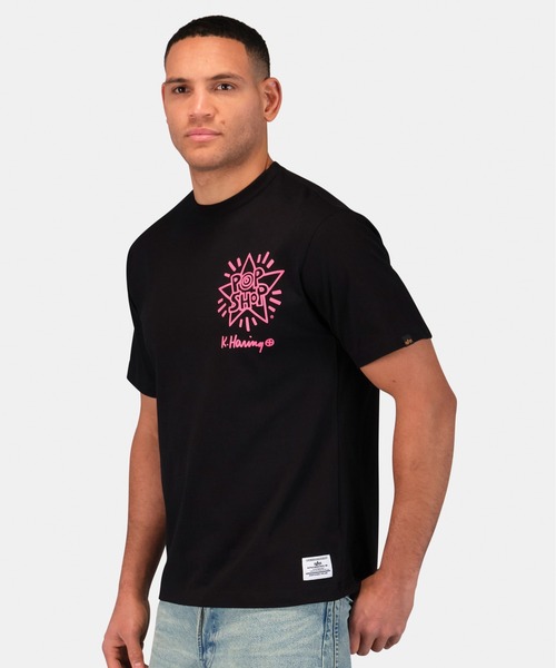 Alpha Industries（アルファインダストリーズ）の「Alpha Industries/アルファインダストリーズ/Keith Haring X Alpha GRAPHIC TEE DRAGON/ キース へリング グラフィック Tシャツ ドラゴン（Tシャツ/カットソー・メンズ・ブラック・SMALL/MEDIUM/LARGE/X-LARGE/X-SMALL）」の6枚目の写真