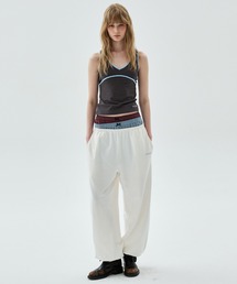 Mardi Mercredi（マルディメクルディ）の「JOGGER PANTS MARDI LOGO HOTFIX / ジョガー パンツ マルディ ロゴ ホットフィックス（スウェットパンツ）」