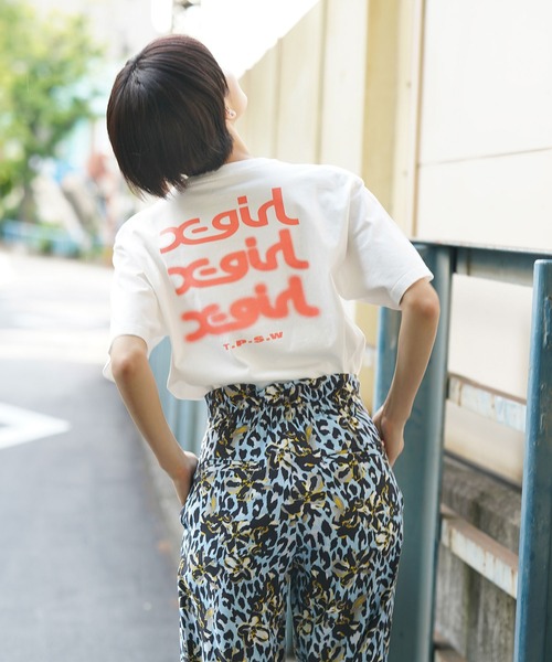 X-girl(エックスガール)の「GLOW LOGO S/S TEE(Tシャツ/カットソー・レディース・ホワイト/ブラック/ライトパープル/グリーン・S/M/L/XL)」の1枚目の写真