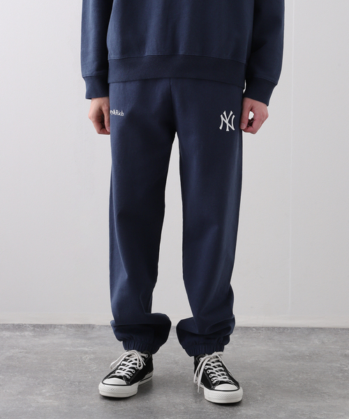 SPORTY&RICH(スポーティアンドリッチ)の「【SPORTY&RICH / スポーティアンドリッチ】YANKEES SERIF SWEATPANT(スウェットパンツ・メンズ・ネイビー・MEDIUM/SMALL)」の9枚目の写真