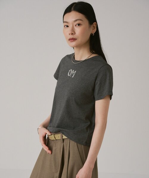 Omekashi(オメカシ)の「【スパンコールロゴがポイント◎】OMスパンコールロゴT(Tシャツ/カットソー・レディース・オフホワイト/チャコールグレー・FREE)」の7枚目の写真