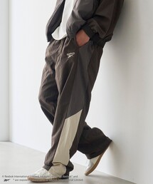 Reebok（リーボック）の「Reebok（リーボック）別注ナイロントラックパンツ（その他パンツ）」
