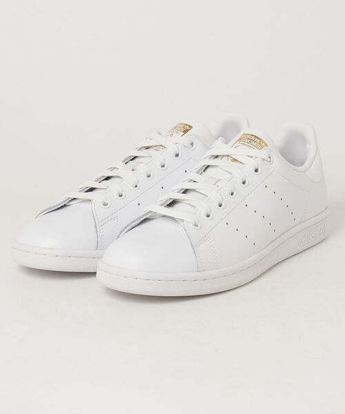 adidas(アディダス)の「adidas STAN SMITH アディダス スタンスミス(スニーカー・メンズ・ホワイト/ホワイト×ゴールド・23cm/23.5cm/24cm/24.5cm/25cm/25.5cm/26cm/26.5cm/27cm/27.5cm/28cm/22cm/22.5cm/28.5cm/29cm)」の2枚目の写真