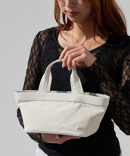 NOTHING WRITTEN（ナッシングリトゥン）の「NOTHING WRITTEN / ナッシングリトゥン 1967 half tote bag カウレザー ハンドバッグ 2026年春夏（ハンドバッグ・レディース・ブラック/ナチュラル・FREE）」の2枚目の写真