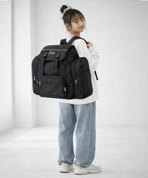Karlas（カルラス）の「【karlas別注】FILA フィラ サブリュック 拡張付リュックサック 子供 キッズ 学生 通学 通勤 大容量 筆記体ロゴ（バックパック/リュック）」