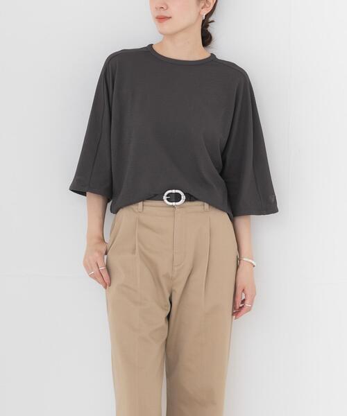NEW BALANCE(ニューバランス)の「NEW BALANCE NB GREY ショートスリーブトップ(Tシャツ/カットソー・レディース・オフホワイト/ブラック・MEDIUM)」の2枚目の写真