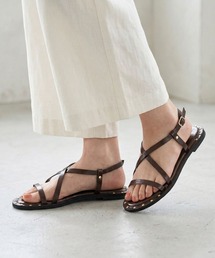 SEVEN TWELVE THIRTY（セヴントゥエルヴサーティー）の「クロスストラップスタッズサンダル（サンダル）」
