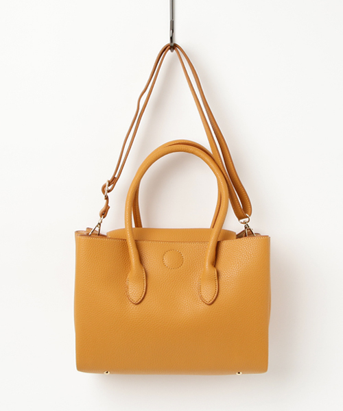 un dix cors（アンディコール）の「バンブーヒネリバッグ（ショルダーバッグ・レディース・モカ/オレンジ・ﾌﾘ-）」の4枚目の写真