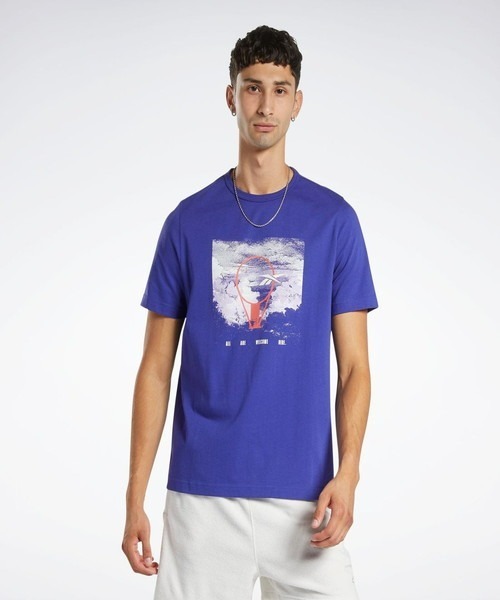 Reebok(リーボック)の「バスケットボールリムショートスリーブT / BB BASKETBALL AAWH RIM SS(Tシャツ/カットソー・メンズ・ネイビー/ブルーパープル・LARGE/MEDIUM/XX-LARGE/XXX-LARGE/X-LARGE/SMALL)」の1枚目の写真
