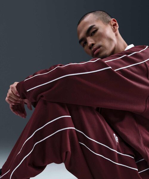 NIKE(ナイキ)の「《セットアップ対応商品》ナイキ スポーツウェア クラブ メンズ オーバーサイズ ニット トラック パンツ / Nike Sportswear Club Men's Oversized Knit Track Pants HV1416-619 Dark Team Red(その他パンツ・メンズ・レッド系その他・2XL/L/M/S/XL)」の9枚目の写真