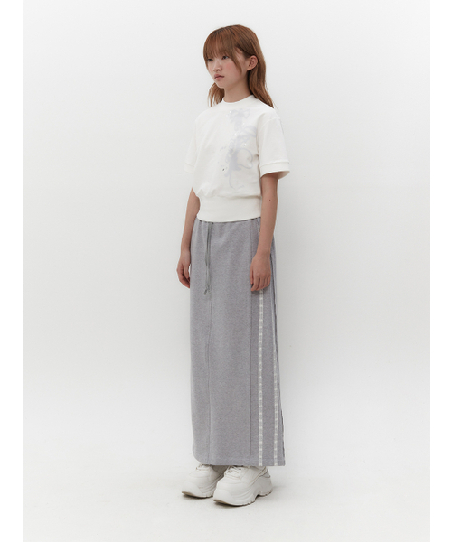 TUOMIO（トゥオミオ）の「RIBBON GRAPHIC MOCK NECK TOP [WHITE]（Tシャツ/カットソー・レディース・その他・1/2）」の3枚目の写真
