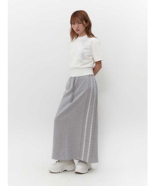 TUOMIO（トゥオミオ）の「RIBBON GRAPHIC MOCK NECK TOP [WHITE]（Tシャツ/カットソー・レディース・その他・1/2）」の6枚目の写真